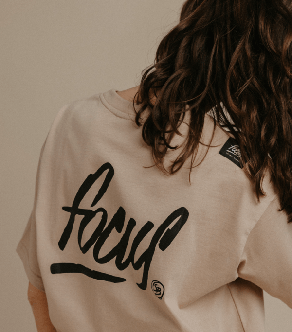 brown focus t-shirt on female model back