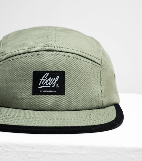 zoom on front of focus 5 panel green cap