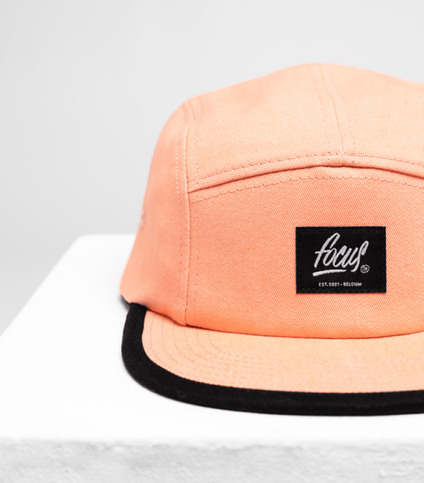 zoom on front of focus 5 panel pink cap