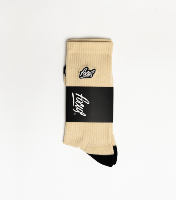 focus nature sports socks packaged in black cardboard square